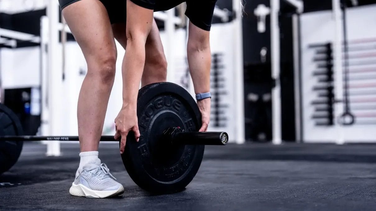 Barbell workout in a gym