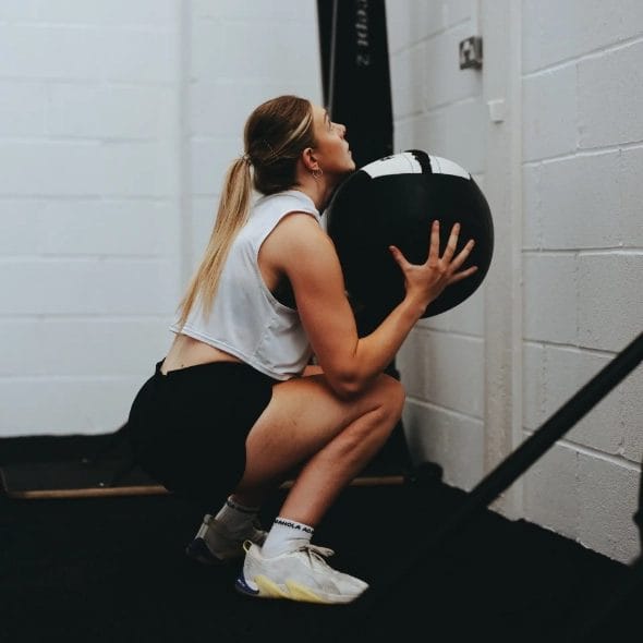 woman doing ball walls